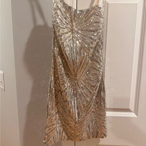 2 junior prom dresses; Silver and Green sz XS